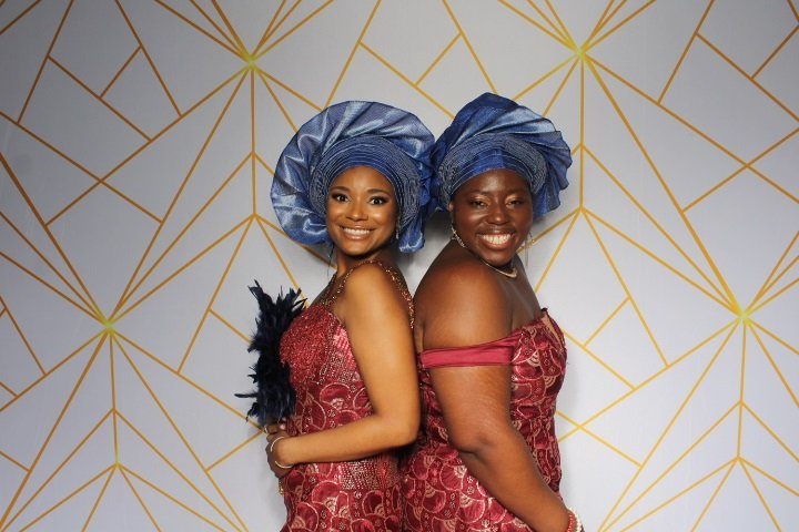 Wedding guests posing in colorful attire