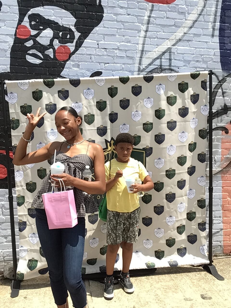 Guests enjoying an outdoor school celebration photo booth